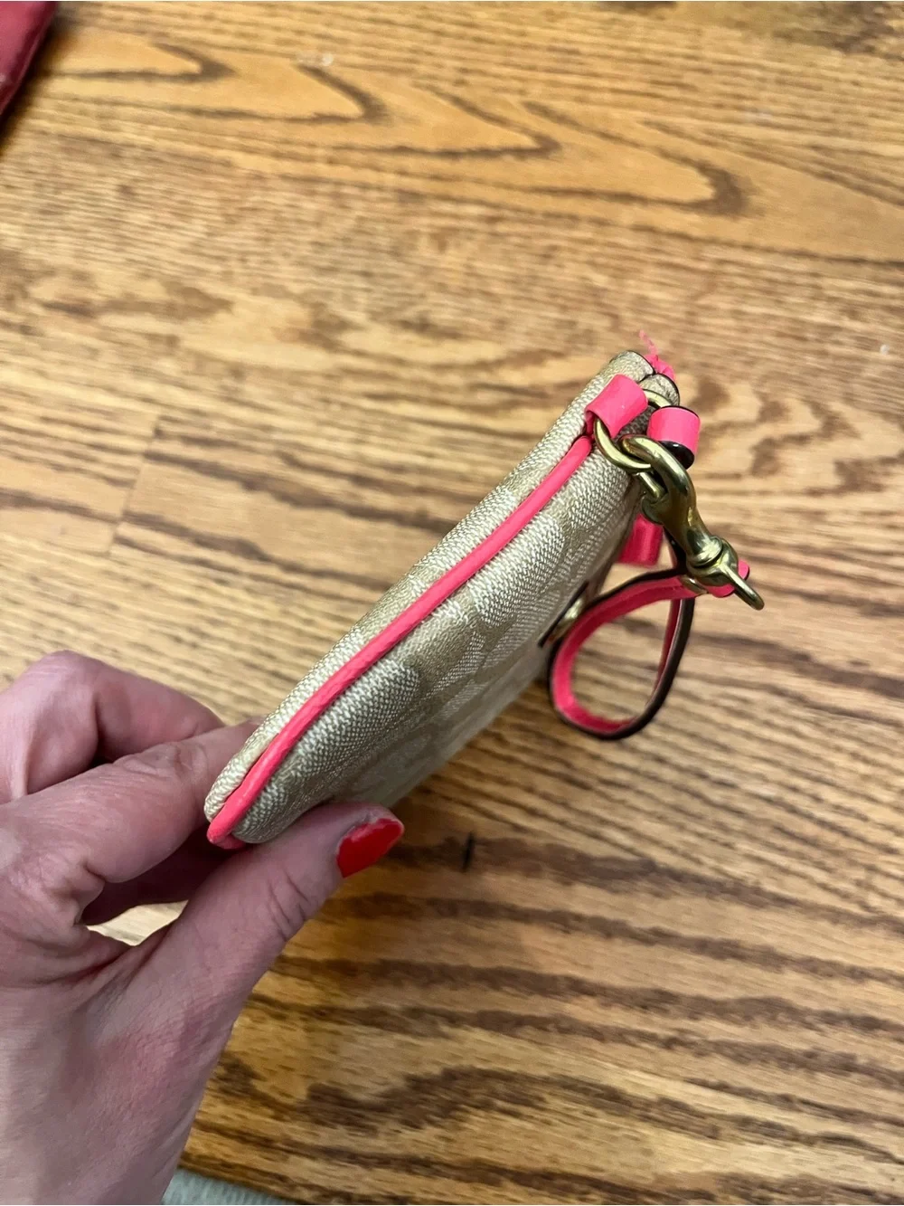 Coach Signature Canvas Wristlet with Coral Trim and Gold Hardware